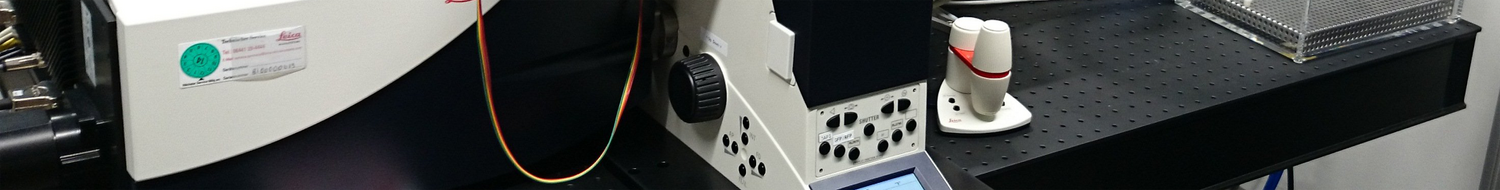 Partial view on an advanced laser scanning microscope system on an optical table